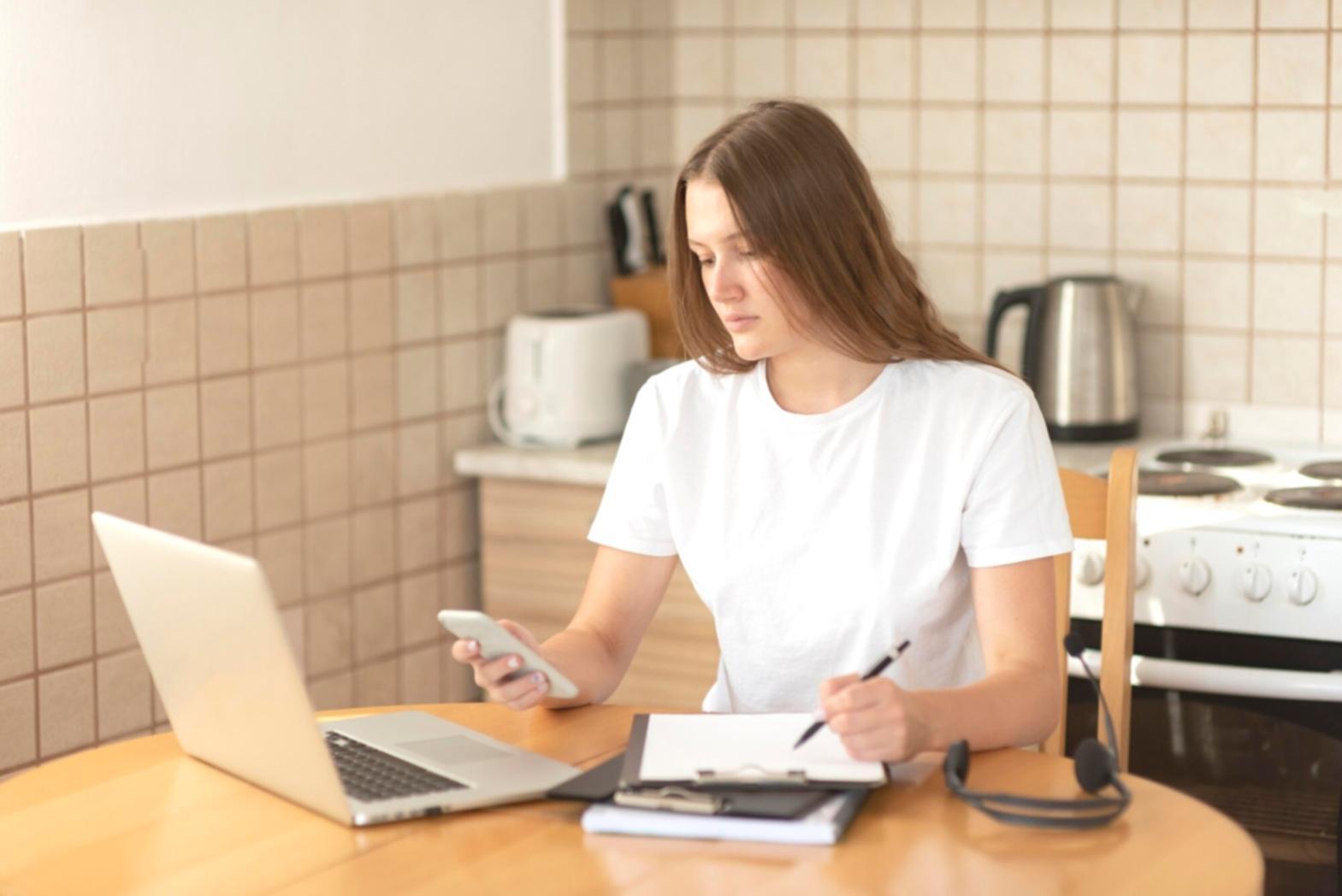 Professional financial planning consultation showing budget documents and planning materials